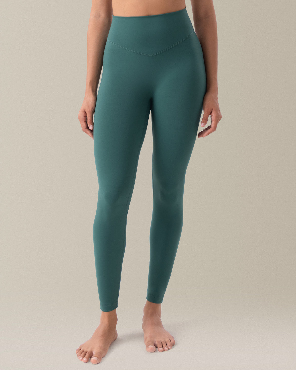 YUNOGA HugMotion Women's 25" No Front Seam Leggings showcases high-waisted design and seamless waistband - Hunter Green