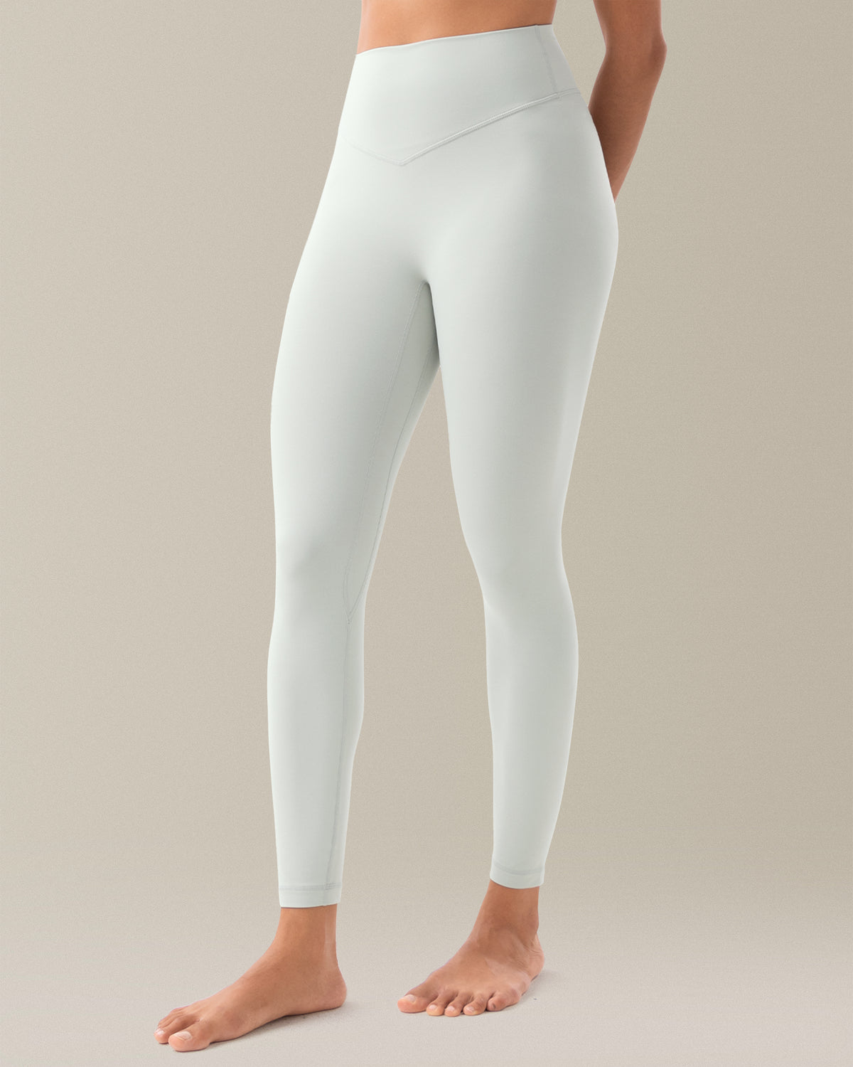 YUNOGA HugMotion Women's 25" No Front Seam Leggings in Foggy Green
, showcases high-waisted design and seamless waistband