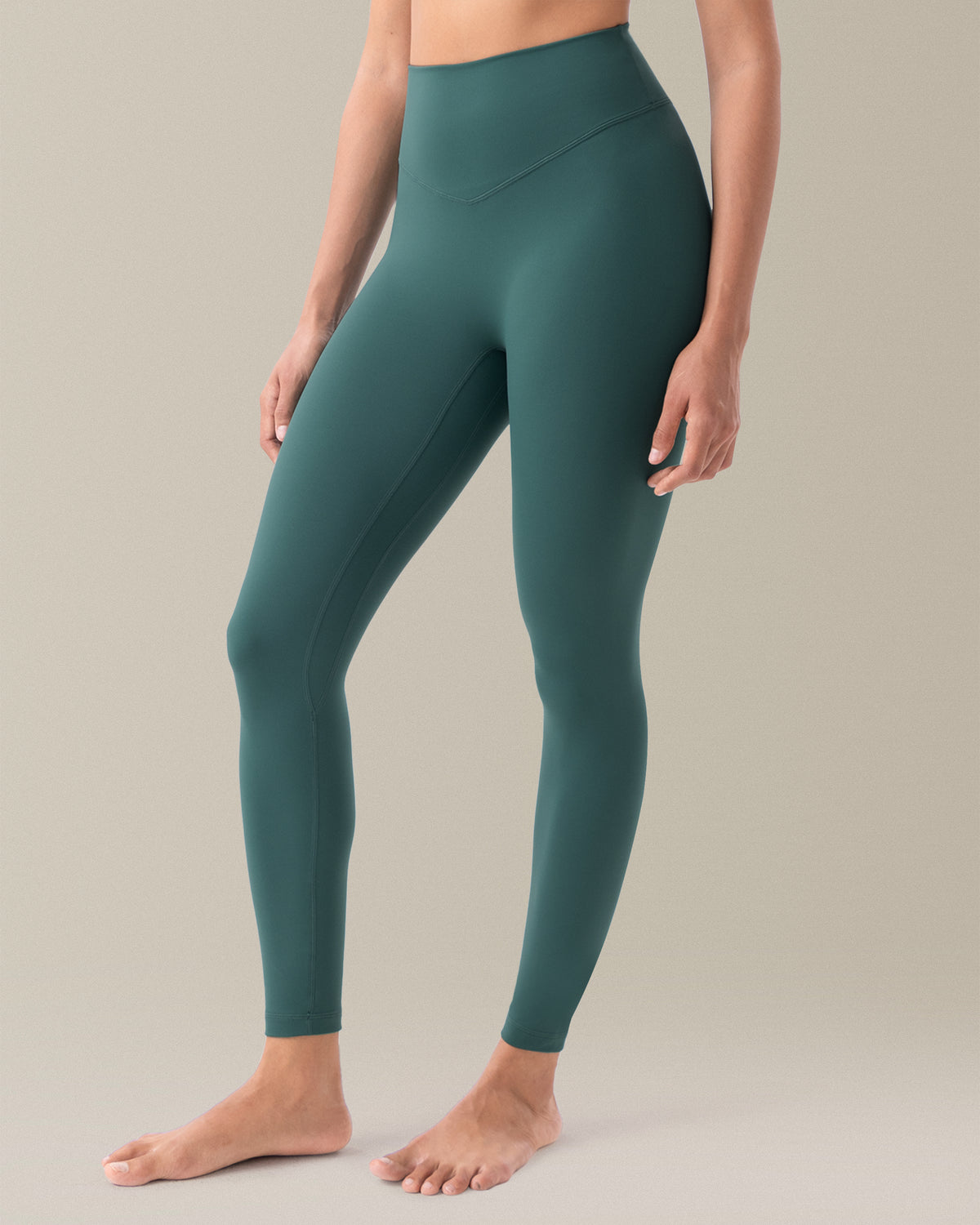 YUNOGA HugMotion Women's 25" No Front Seam Leggings showcases high-waisted design and seamless waistband - Hunter Green