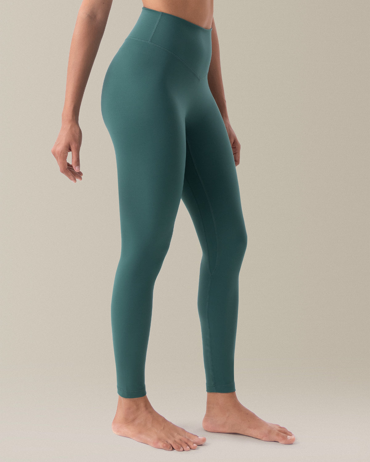 YUNOGA HugMotion Women's 25" No Front Seam Leggings showcases high-waisted design and seamless waistband - Hunter Green