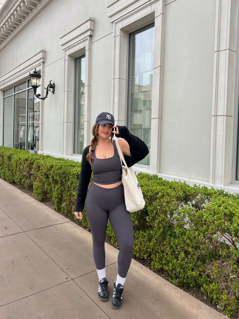 Charcoal grey yoga leggings and sports bra set by Yunoga—functional for workouts, fashionable for urban athleisure style