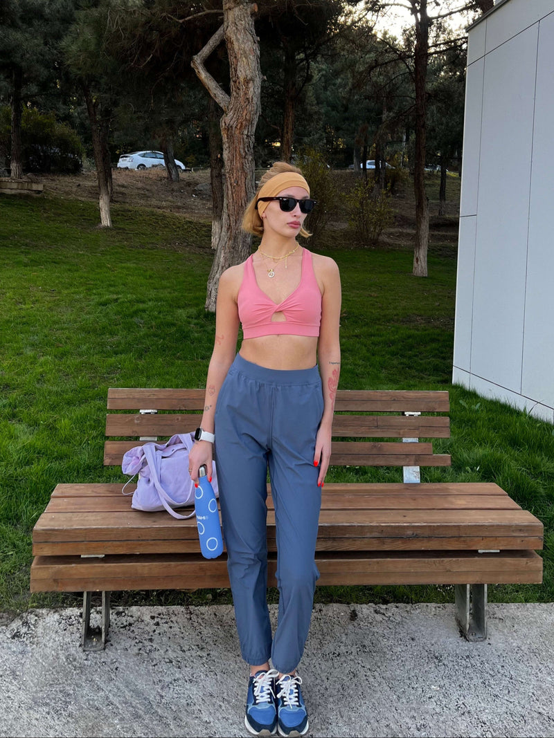 Yunoga pink sports bra with relaxed blue joggers—casual activewear for light cardio and lounging