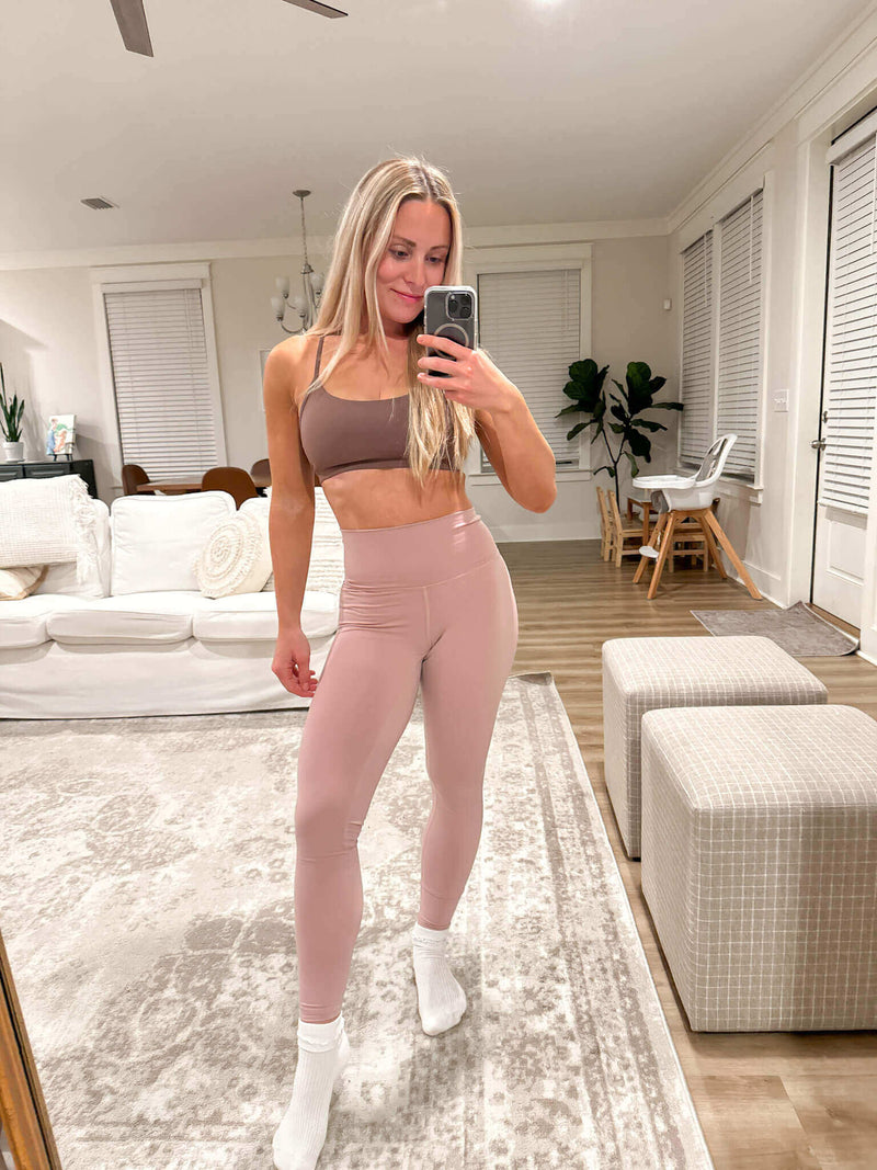 Pink sude leggings and mocha brown sports bra from Yunoga—supportive gym outfit for women who love soft hues